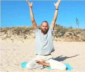 Michaël Bijker practising pranayama breathing on the beach